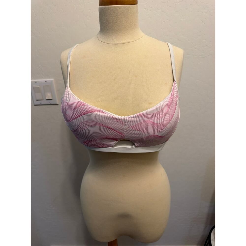 Pink and white sports bra size L